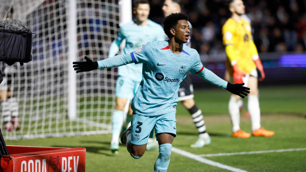 Alejandro Balde pictured celebrating after scoring for Barcelona in a 3-1 win at Unionistas de Salamanca in the Copa del Rey in January 2024